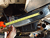 Locate bracket with tape measure